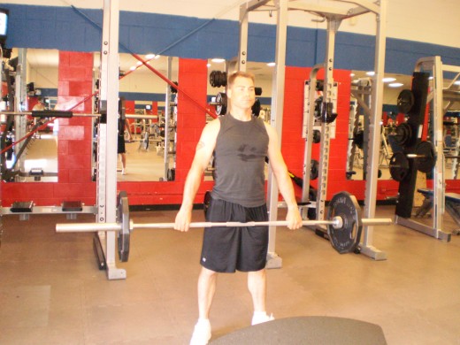 The Barbell Stiff legged deadlift up position