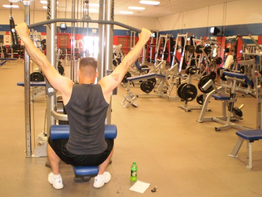 The Seated Lat Pulldown start position