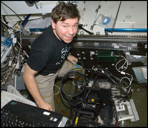 Barratt in the Destiny laboratory of the space station.