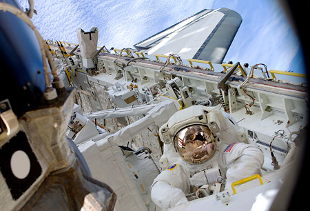 Astronaut Kopra in a space walk.