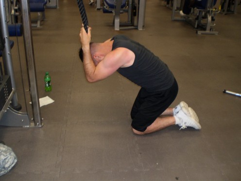 The Cable Crunch up position