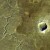 Asteroid crater Arizona.  One mile across.  A body of this size would be serious for Earth climate    photo geology com