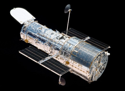 Courtesy of NASA/ Atlantis bids Hubble a last farewell.