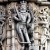 A ferocious god.Sword in one hand, Head of a man in another.Naked with ornaments dangling on his thighs, he wears a snake on his chest.Wears a moustache and beard. Resembles Hindu god Rudra. A ferocious god.Sword in one hand, Head of a man in another.Naked with ornaments dangling on his thighs, he wears a snake on his chest.Wears a moustache and beard. Resembles Hindu god Rudra.