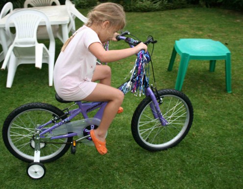 Caitlin the day she got her bike. Her bike is a Raleigh "Jazzi", by the way.