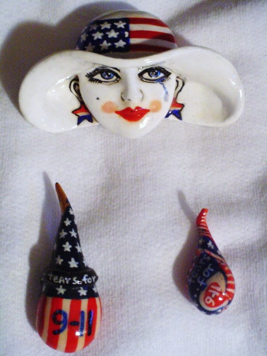 Lady Liberty weeps for the masses lost and tears for 9/11  drape the fabric of our society.