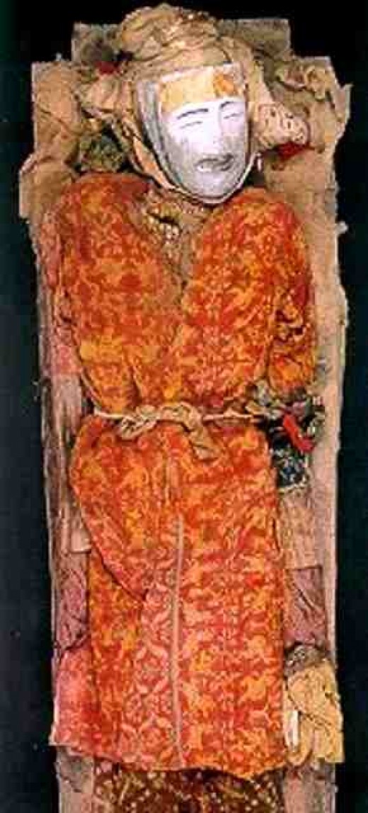 mummie wearing chinese mask