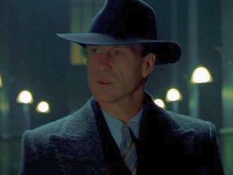 John Hurt; investigating shadows.