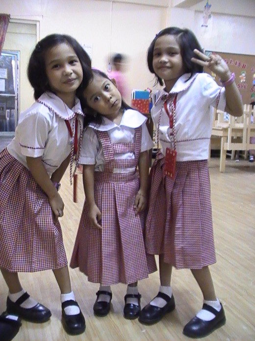 The twins with a young friend and daycare classmate Margaret