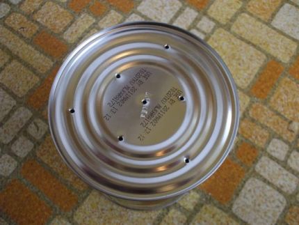 Make a few drainage holes in your recycled cans so plants do not get soggy
