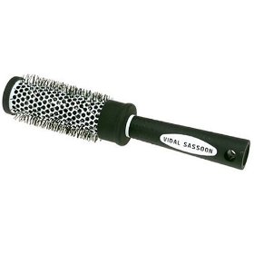 I suggest using a round thermal brush to blow dry your hair with.