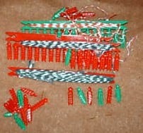Notice the candy striped string and Christmas red and green clothes pins