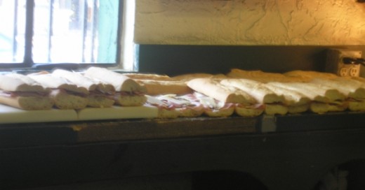 Here's delicious Cuban Sandwiches waiting to be pressed in a Cuban Restaurant.