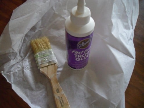 Use a wide flat brush and some white paper glue to mix up a paste of glue and acrylic paint.