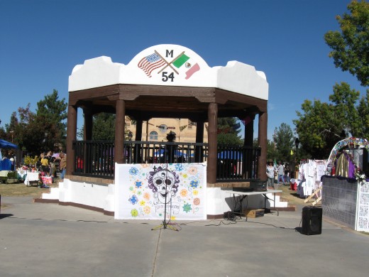 Gazebo in plaza in La Mesilla, NM decked out for El Día de los Muertos.