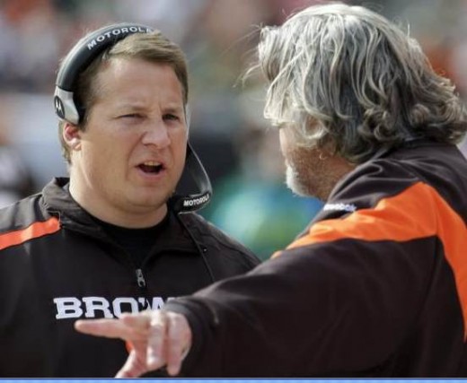 Cleveland Browns coach Eric Mangini, left, talks with defensive coordinator Rob Ryan in the first quarter in an NFL football game against the Green Bay Packers, Sunday, Oct. 25, 2009, in Cleveland. (AP Photo/Tony Dejak)