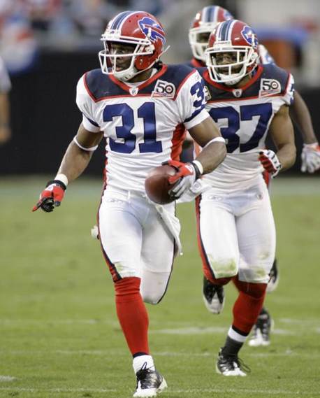 Buffalo Bills' Jairus Byrd (31) runs the ball after an interception with teammate George Wilson (37) against the Carolina Panthers in the second half of an NFL football game in Charlotte, N.C., Sunday, Oct. 25, 2009.  (AP Photo/Rick Havner)