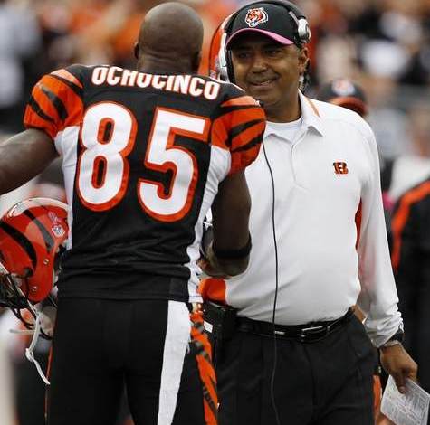 Bengals head coach Marvin Lewis shakes hands with Chad Ochocinco in the first quarter. The Enquirer/Jeff Swinger