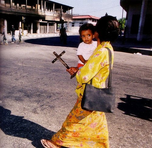 Ambon Woman and her son on the way to the church during Ambon's riot (1999)
