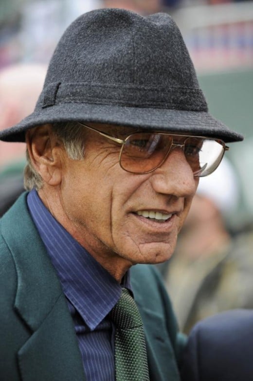 Former New York Jets quarterback Joe Namath looks on before the Jets play the Miami Dolphins at Giants Stadium in East Rutherford, N.J., Sunday, Nov. 1, 2009. (AP Photo/Bill Kostroun)