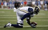 St. Louis Rams safety James Butler intercepts a Detroit Lions Matthew Stafford pass in the second quarter of an NFL football game in Detroit, Sunday, Nov. 1, 2009. Butler was tackled in the endzone for a safety on the play. (AP Photo/Paul Sancya)