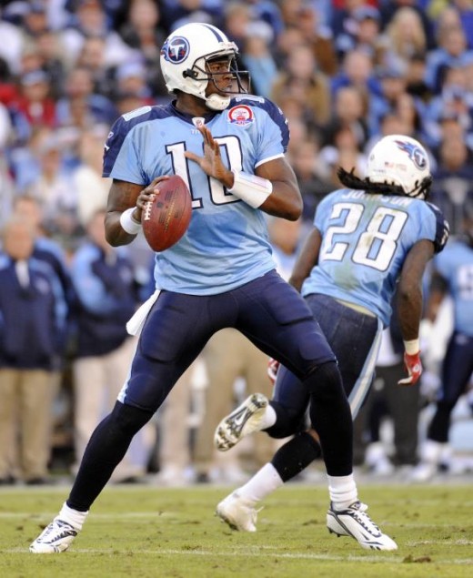 Tennessee Titans quarterback Vince Young (10) looks for a receiver as he plays against the Jacksonville Jaguars in the first quarter of an NFL football game in Nashville, Tenn., Sunday, Nov. 1, 2009. (AP Photo/John Russell)