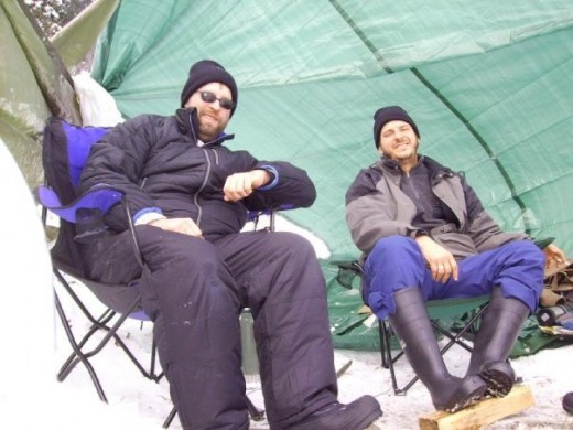 The brothers' Zoltak elevate their feet with split wood.  Photo credit: Tom Kestelik