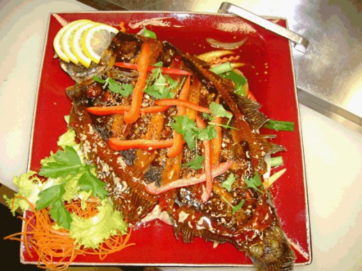Chuu Chee Tilapia is a distinctly Thai Fish dish served in Thailand and Thai Restaurants in the USA. 