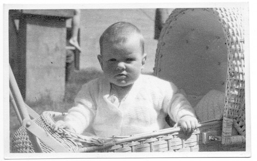 The baby is me, and the pram was a classic. Everyone had a cane pram.