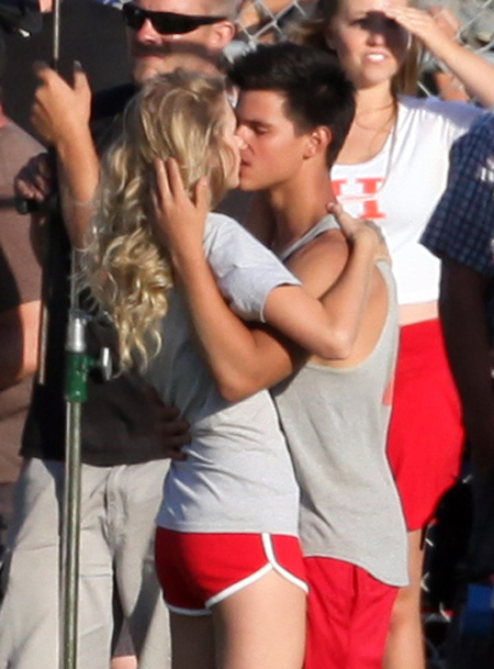 Taylor Swift and Taylor Lautner kissing in a scene from their new movie "Valentine's Day".Taylor Lautner is the "werewolf from Twilight" mentioned in the monologue song