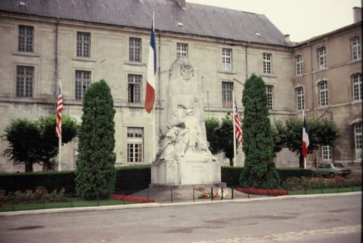 Verdun War Monument with French and American Flags in Verdun, France