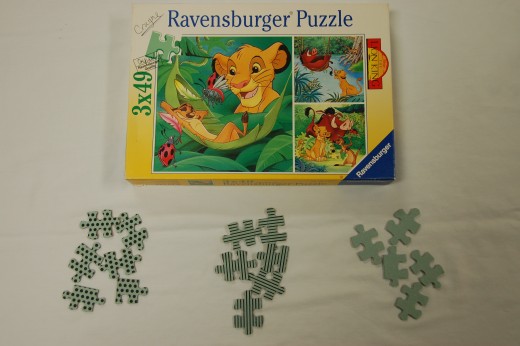 3 puzzles with 3 different markings on the back.  