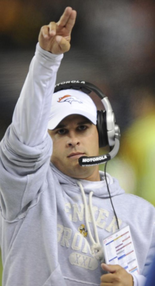 Denver Broncos head coach Josh McDaniels signals a play during the first half in an NFL football game against the Pittsburgh Steelers Monday, Nov. 9, 2009, in Denver. (AP Photo/Chris Schneider)