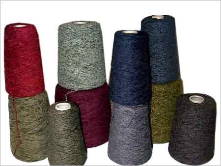 Dyed Yarn on Cones used for Weft in Weaving Machines.