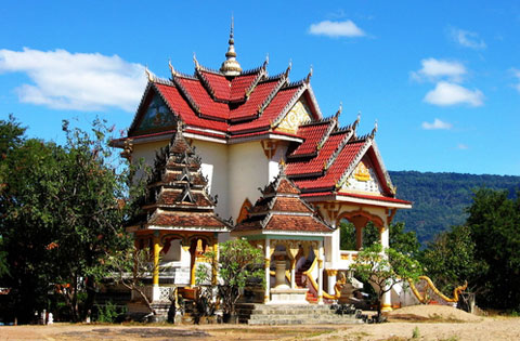 A temple or wat in Pakse, Laos where my father grew up.  I'd like very much to donate one of my own.  My father already has.