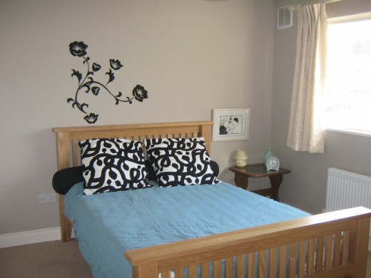 Easy peel stencils from Ikea add interest to a wall.