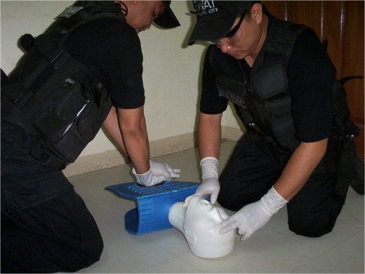 the author with fellow SWAT medic performing CPR