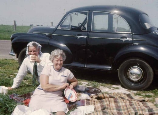 My parents picniccing with my Uncle Jeff Keen's Morris Minor behind them