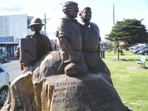 Simpson and his Donkey , an Australian War Hero depicted in a carving at Lakes Entrance.