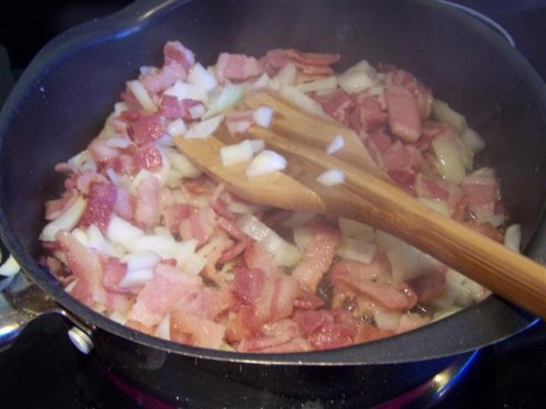 Onions and Bacon Frying For Fried Potato Clam Chowder Soup