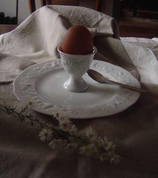 Limoges porcelain egg-cup with one of our own beautiful brown eggs