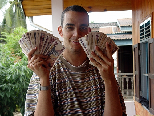 Changing 100 Euro in Laos gave this pile of Kip! Photo: tierecke