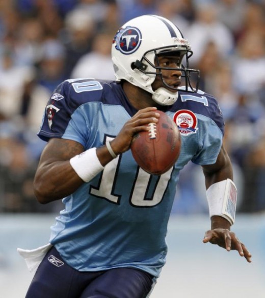 Tennessee Titans quarterback Vince Young looks for a receiver during the first quarter of an NFL football game against the Arizona Cardinals on Sunday, Nov. 29, 2009, in Nashville, Tenn. (AP Photo/Mark Humphrey)