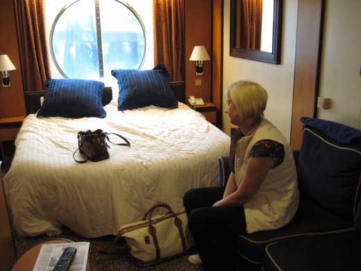 My wife relaxing in cabin aboard Royal Caribbean cruise ship "Serenade of the Seas" 