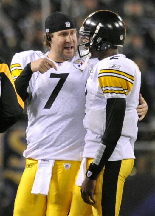 Pittsburgh Steelers Ben Roethlisberger (7) talks with starting quarterback Dennis Dixon, right, during the first half of an NFL football game against the Baltimore Ravens, Sunday, Nov. 29, 2009, in Baltimore. Roethlisberger did not start the game due