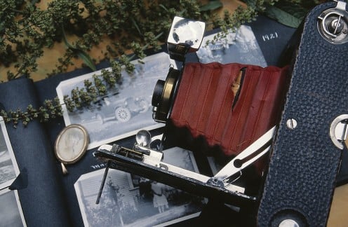 Antique camera and heirloom scrapbook.