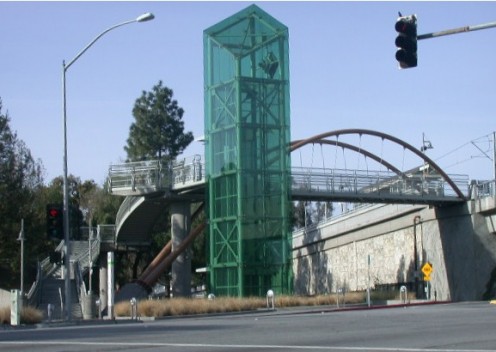 This is a photo of a ground level station along the Santa Clara VTA light rail lines. Light rail has aided many communities in growth through providing quick and inexpensive transportation to and from the job.  