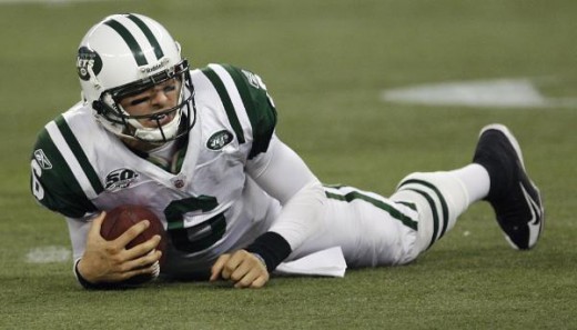 Sanchez reacts after diving for a first down during the third quarter of the NFL football game against the Buffalo Bills at the Rogers Centre in Toronto, Thursday, Dec. 3, 2009. Sanchez left the game with a knee injury. (AP Photo/David Duprey)  