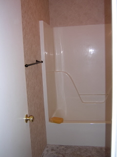 New wallpaper going up... notice the large sponge for smoothing the airbubbles.