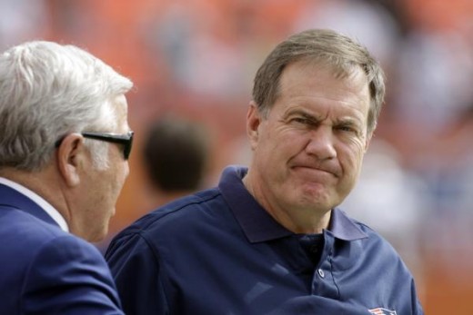 New England Patriots owner Robert Kraft, left, speaks with head coach Bill Belichick prior to the start of an NFL football game in Miami, Sunday, Dec. 6, 2009. (AP Photo/Lynne Sladky)